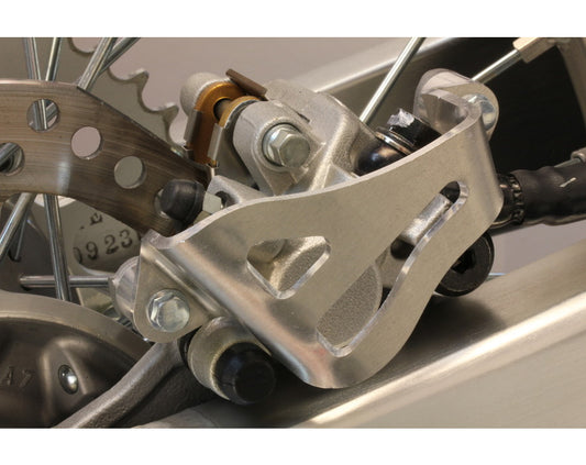 WORKS CONNECTION - REAR CALIPER GUARD - 25-010 - HONDA CR125 95-97 / SUZUKI 00-08 / KAWASAKI KLX400 03-04
